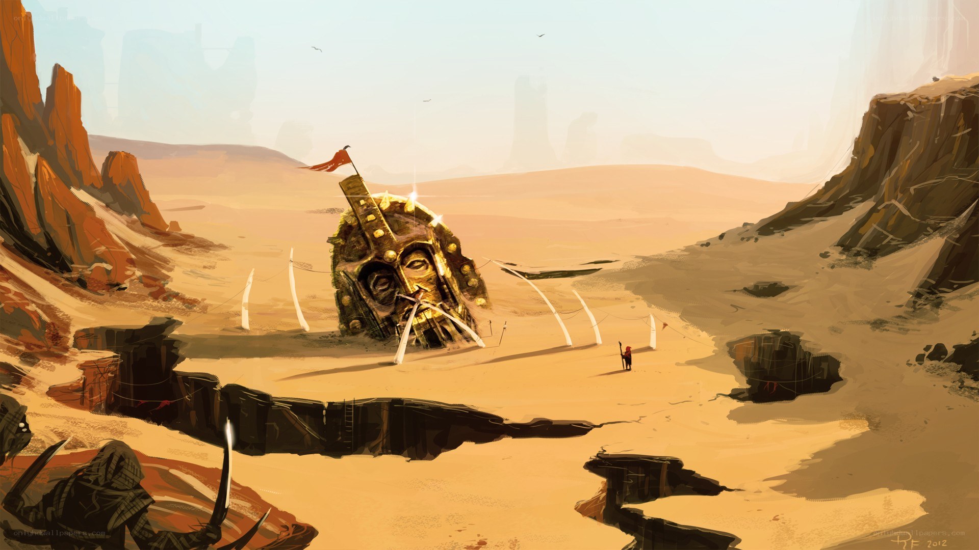 Desert with giant head sculpture