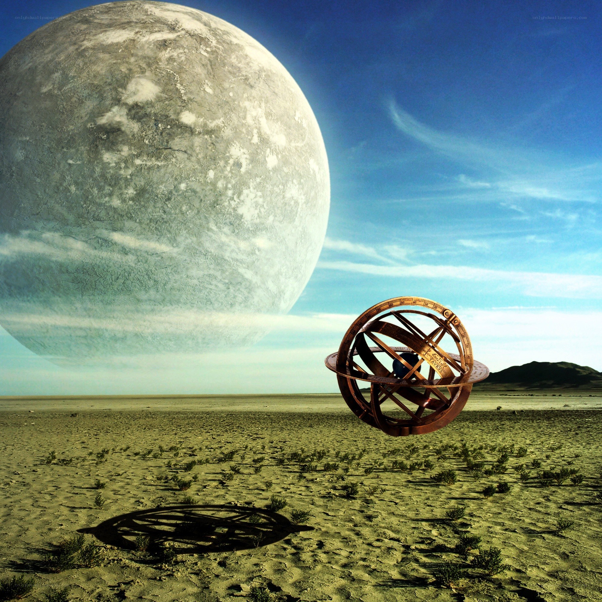 Desert with giant moon and armillary sphere