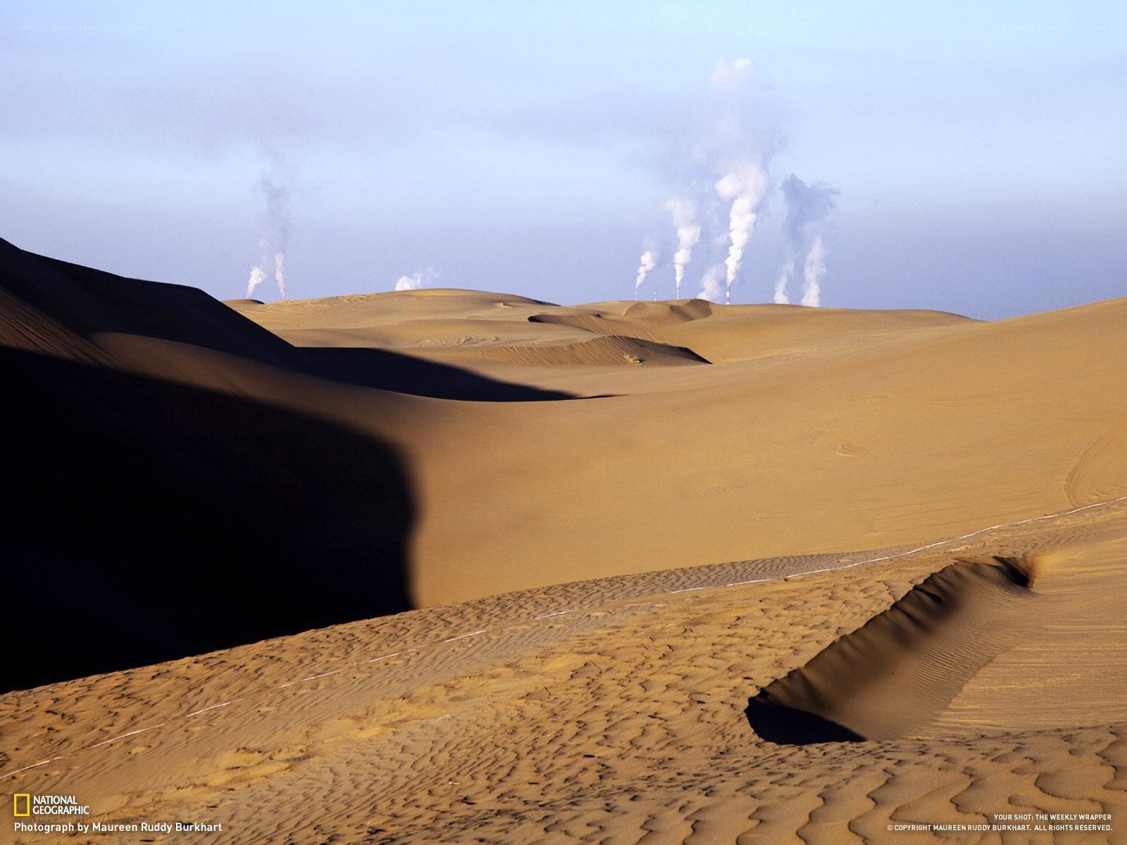 Desert with industrial smoke