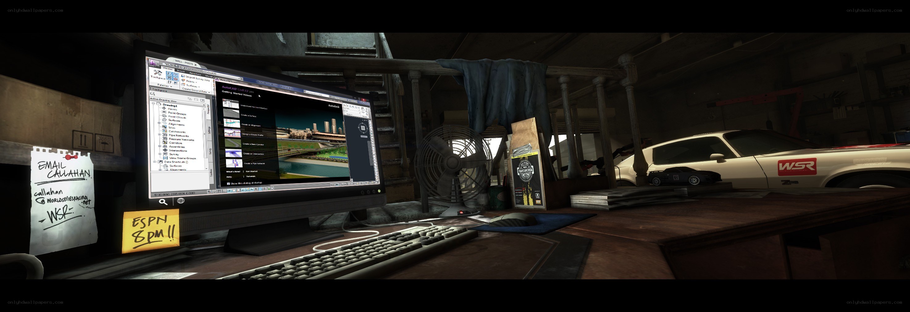 desk in a garage with computer