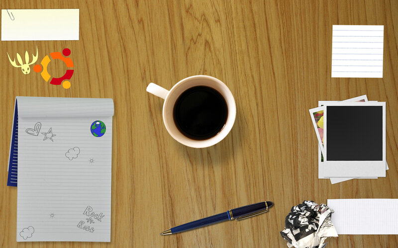 desk with coffee and notes