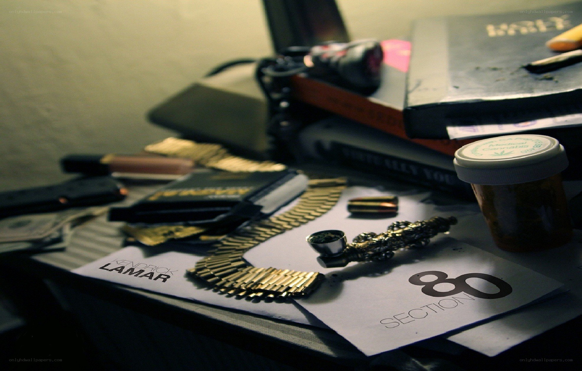 desk with drugs and weapons