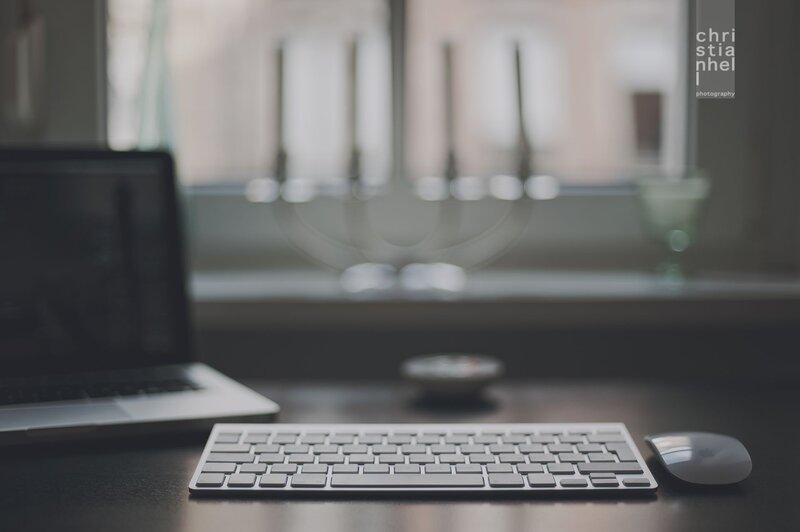 desk with laptop and keyboard
