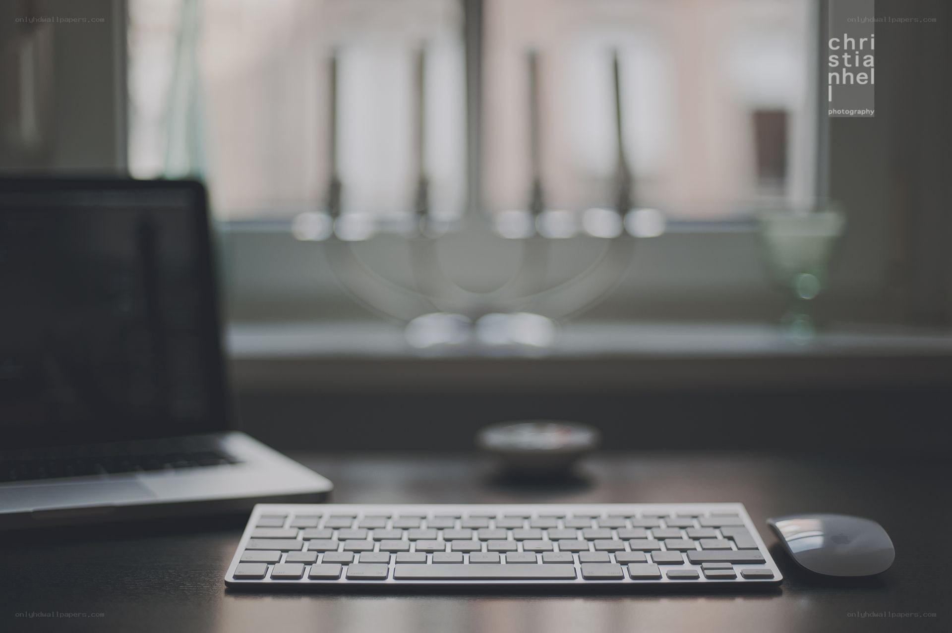 desk with laptop and keyboard