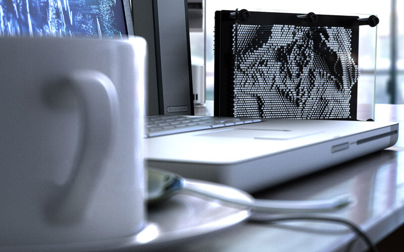 desk with laptop and mug