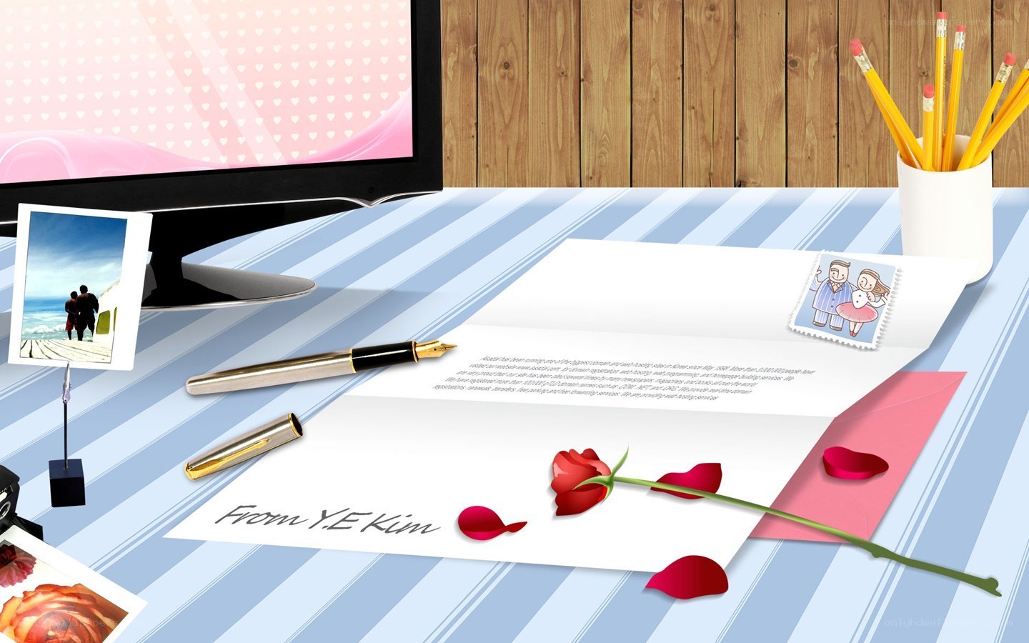 desk with letter and rose