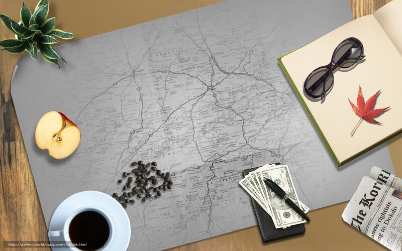 desk with map and coffee