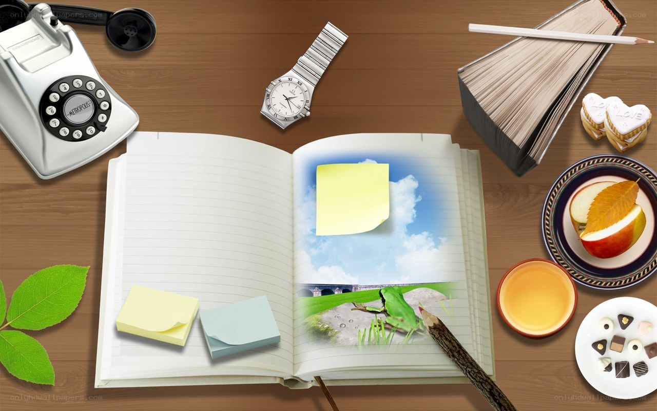 desk with notebook and supplies
