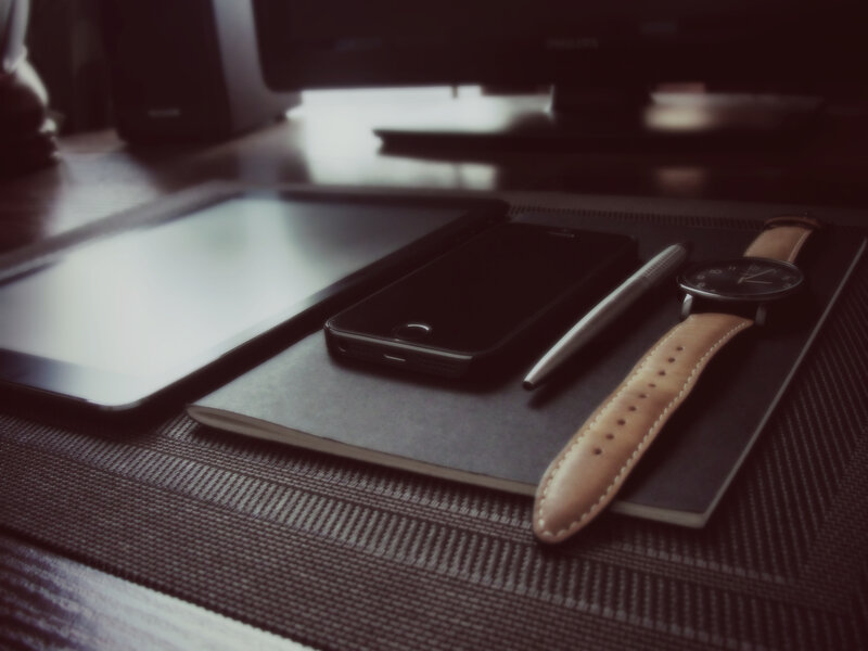 desk with tech and accessories