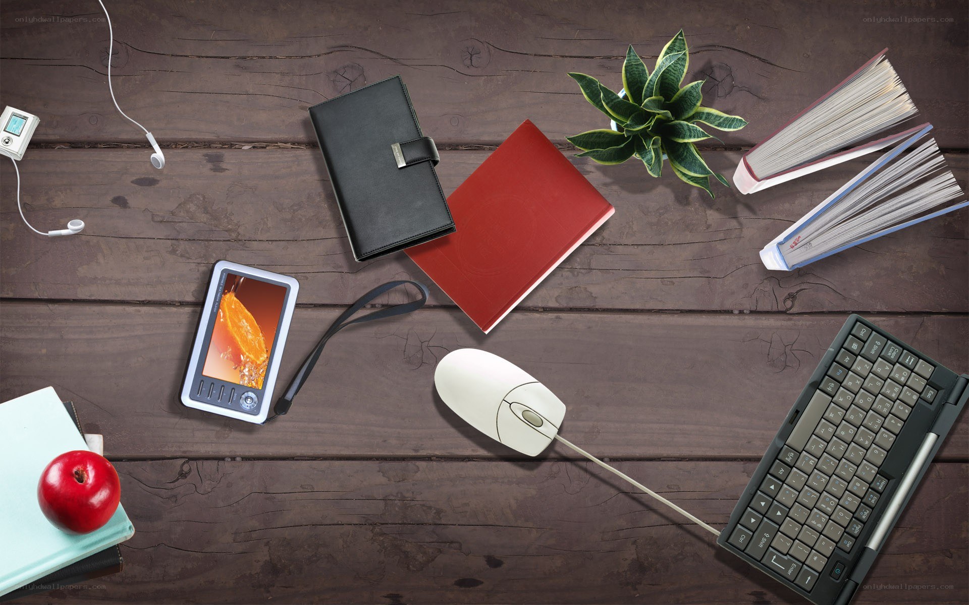desk with tech and office supplies