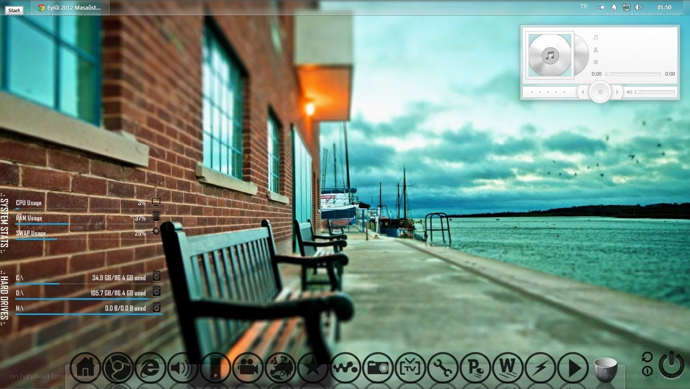 desktop with music player and system stats