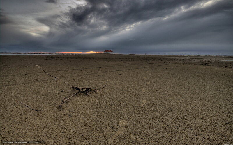 Desolate beach at sunset