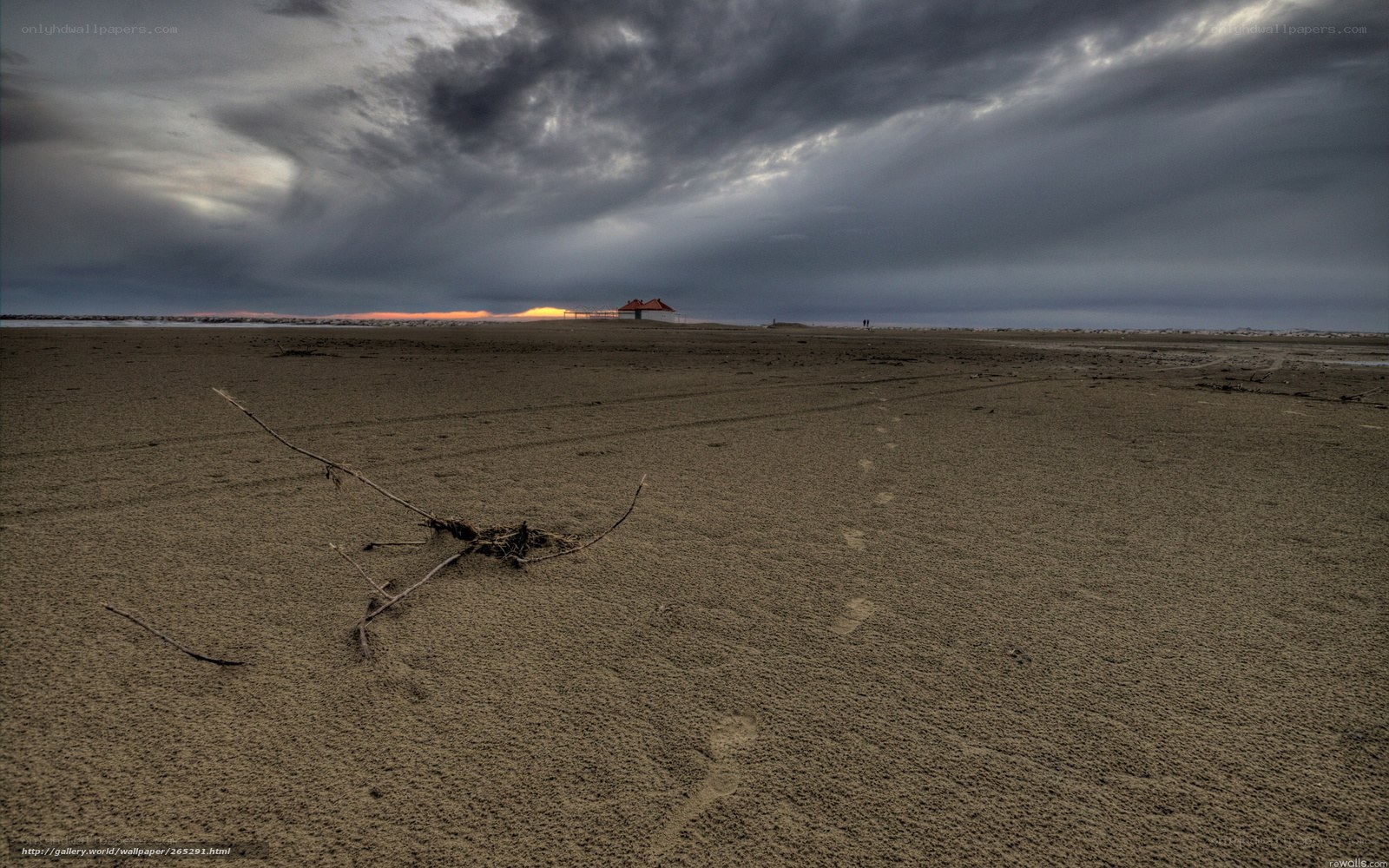 Desolate beach at sunset
