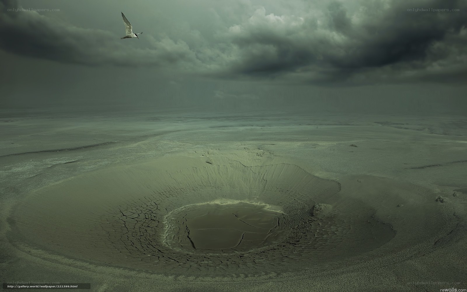 Desolate crater under stormy sky