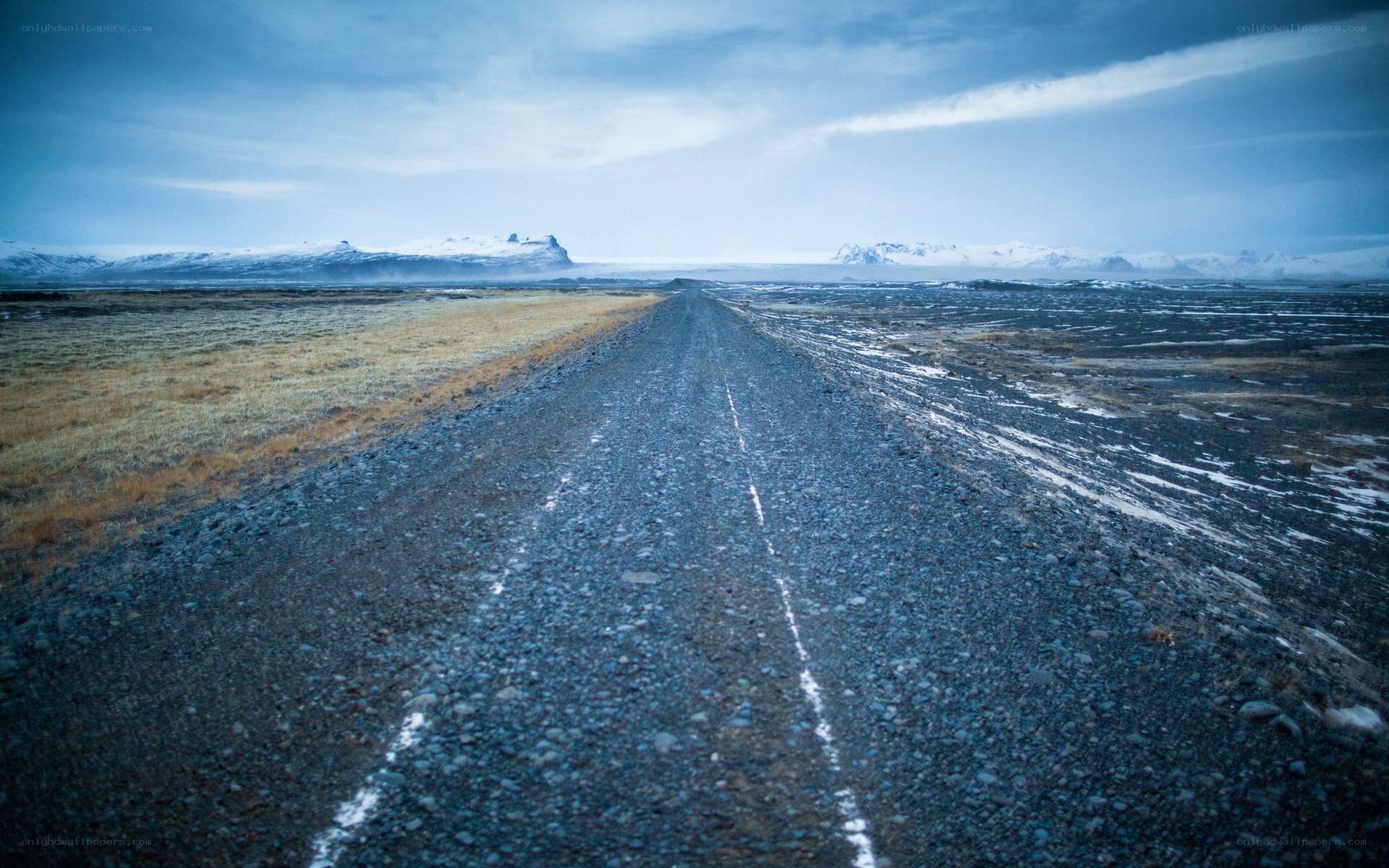 Desolate road in a snowy landscape