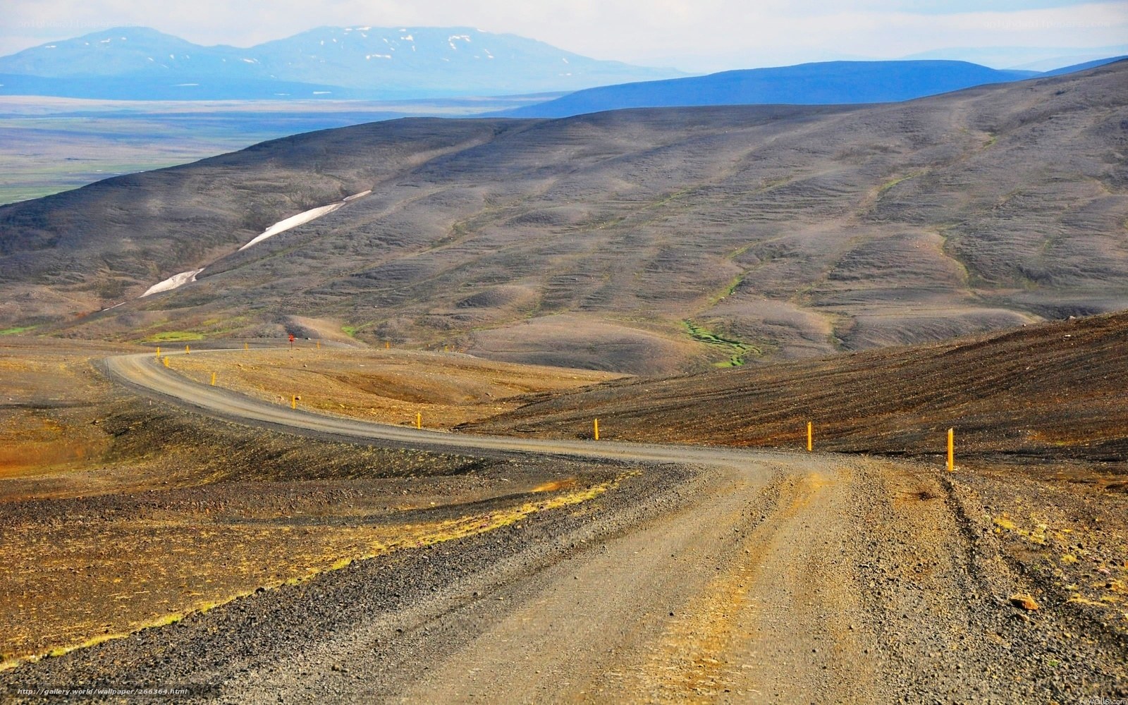 Desolate road in volcanic landscape