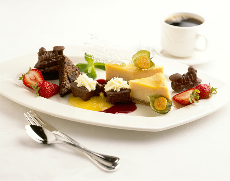 dessert platter with coffee