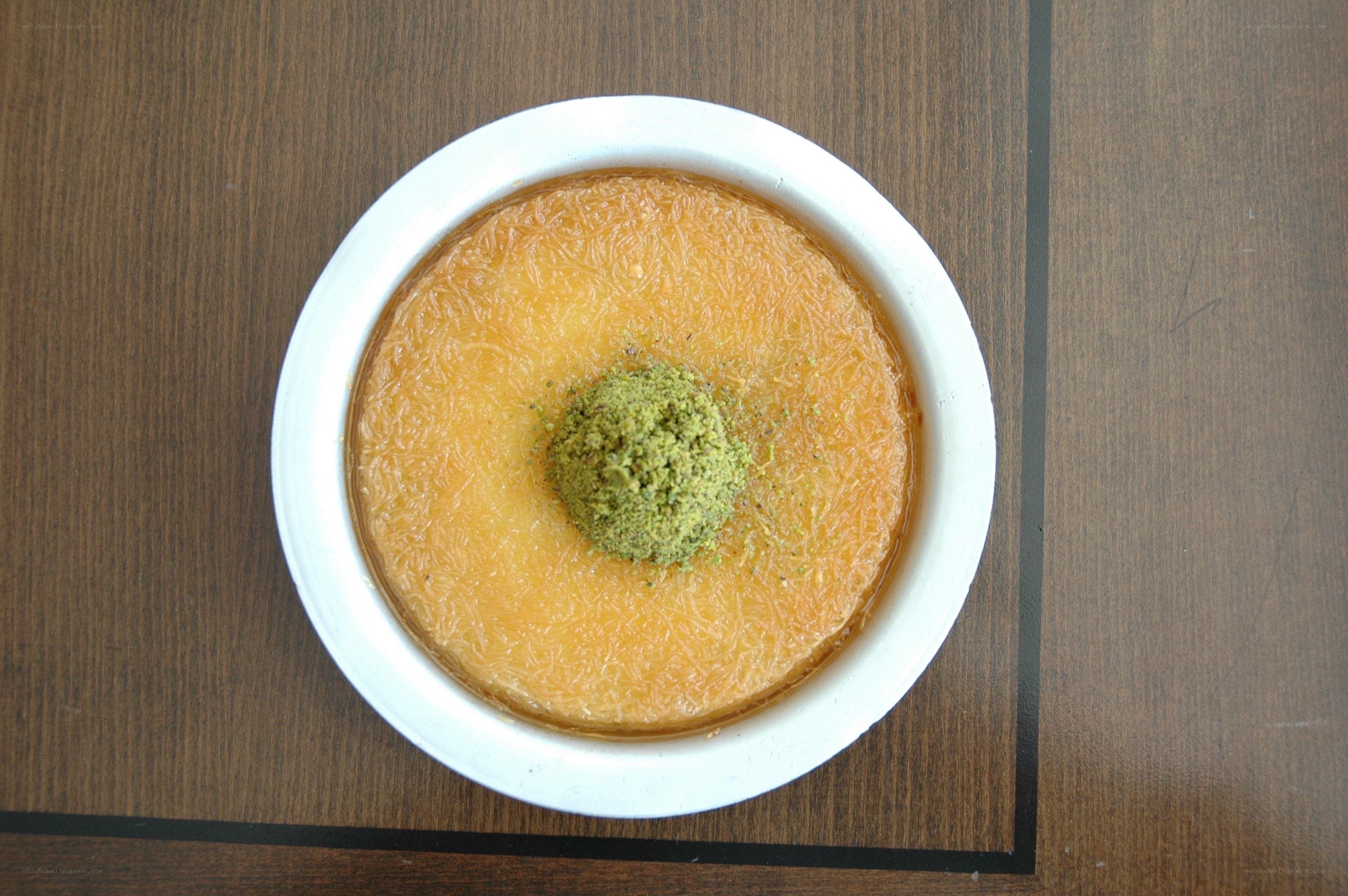 dessert with pistachio topping