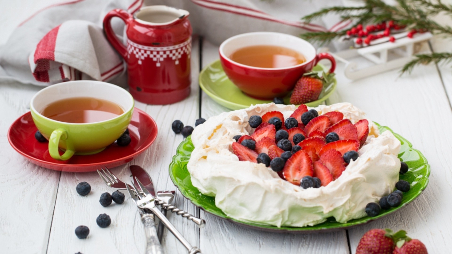 dessert with tea and berries