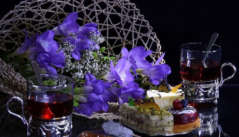Desserts and Tea on Table — Purple