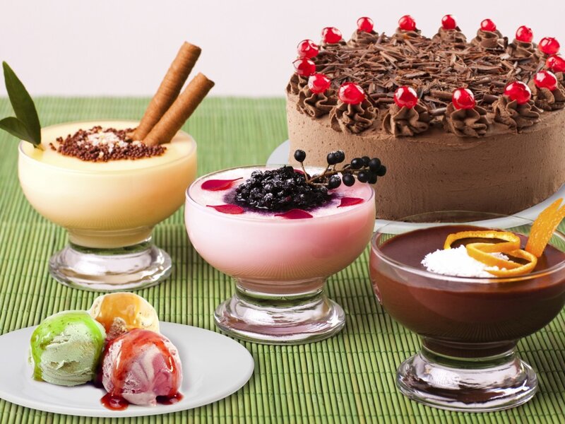 Desserts on Green Mat — Appetizing