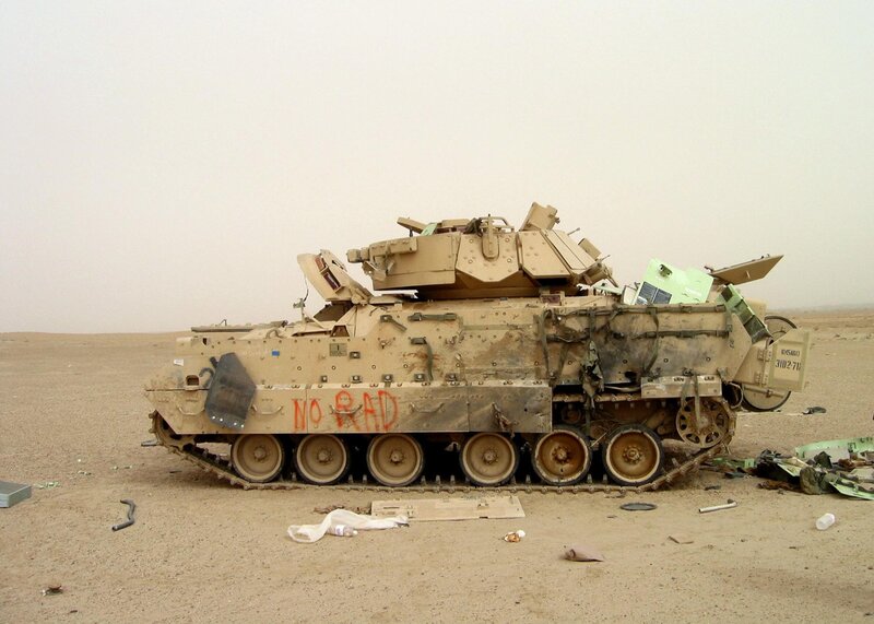 Destroyed military tank in desert