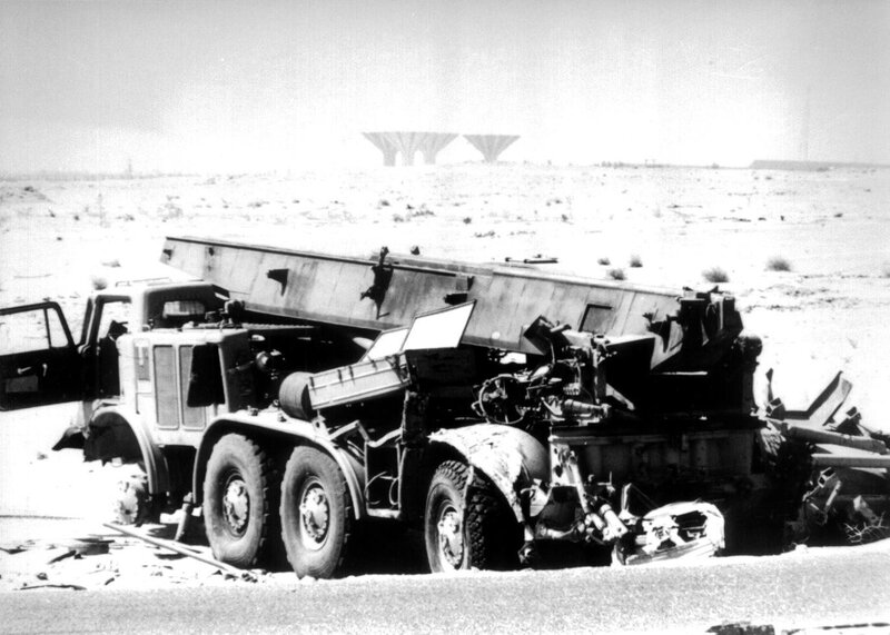 Destroyed military truck in desert