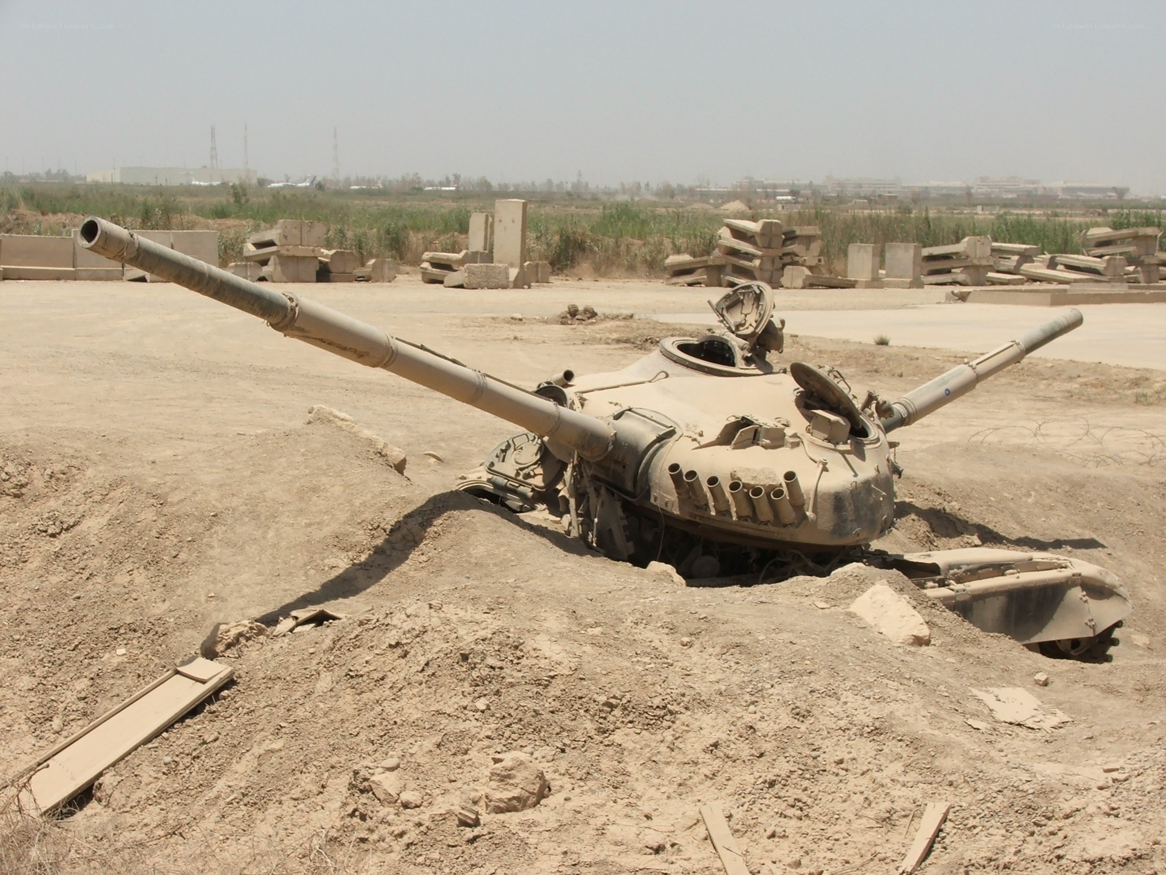 Destroyed tank in desert
