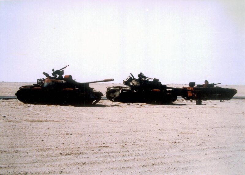 Destroyed tanks in desert