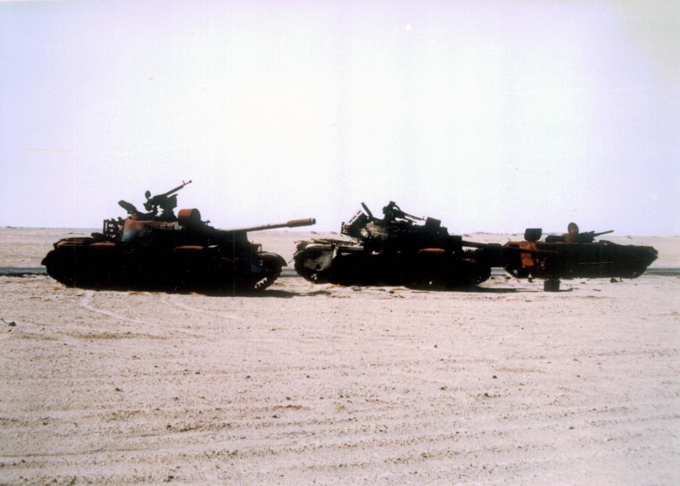 Destroyed tanks in desert