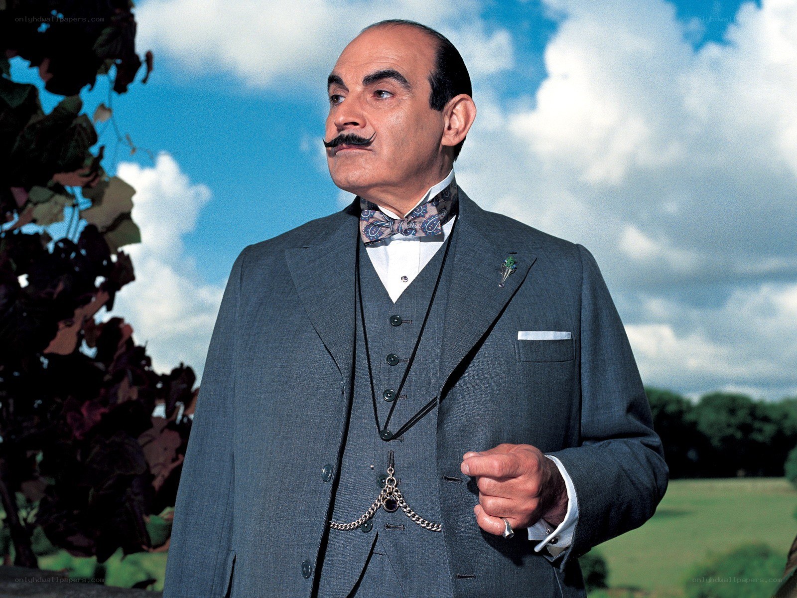 Detective with mustache in suit