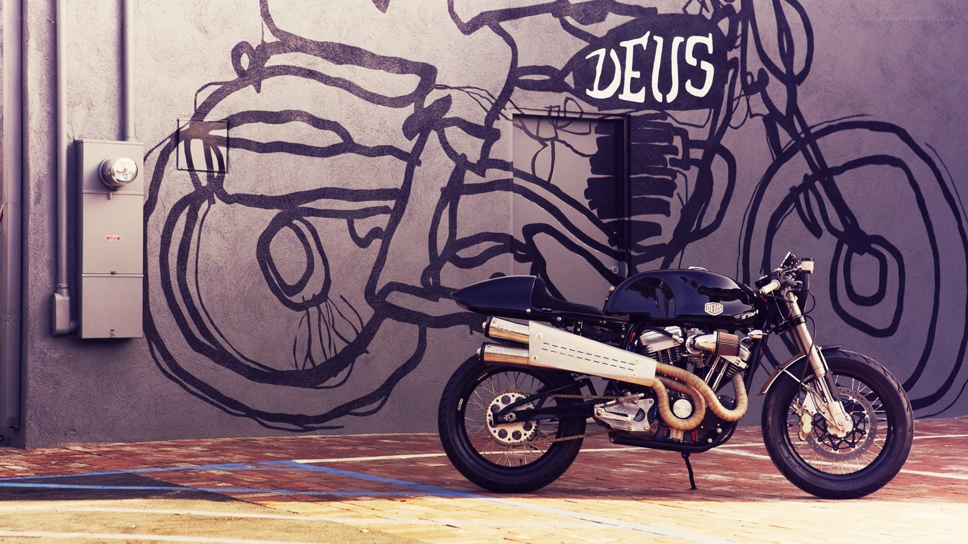 Deus motorcycle with graffiti art