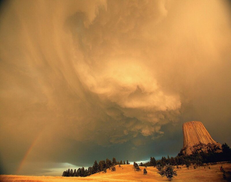 Devil's Tower under stormy sky