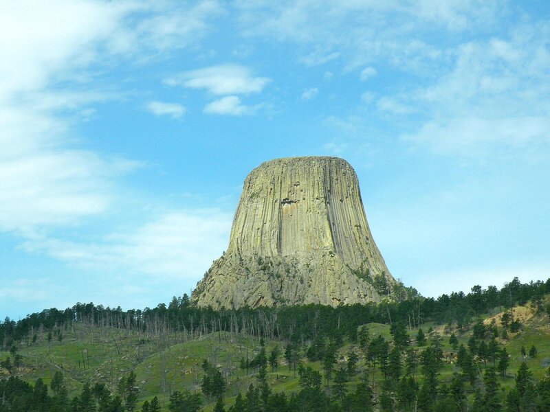 Devils Tower Rock Formation — Blue, Serene, Afternoon, Photograph, Forest