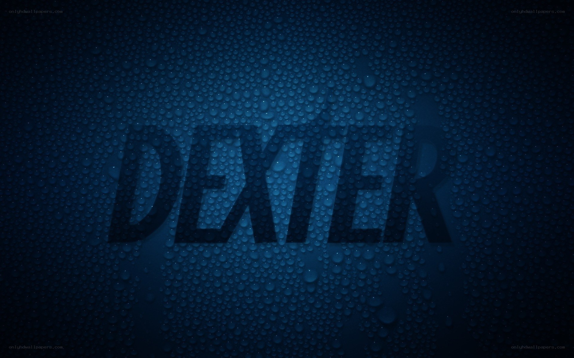 Dexter text on water droplets
