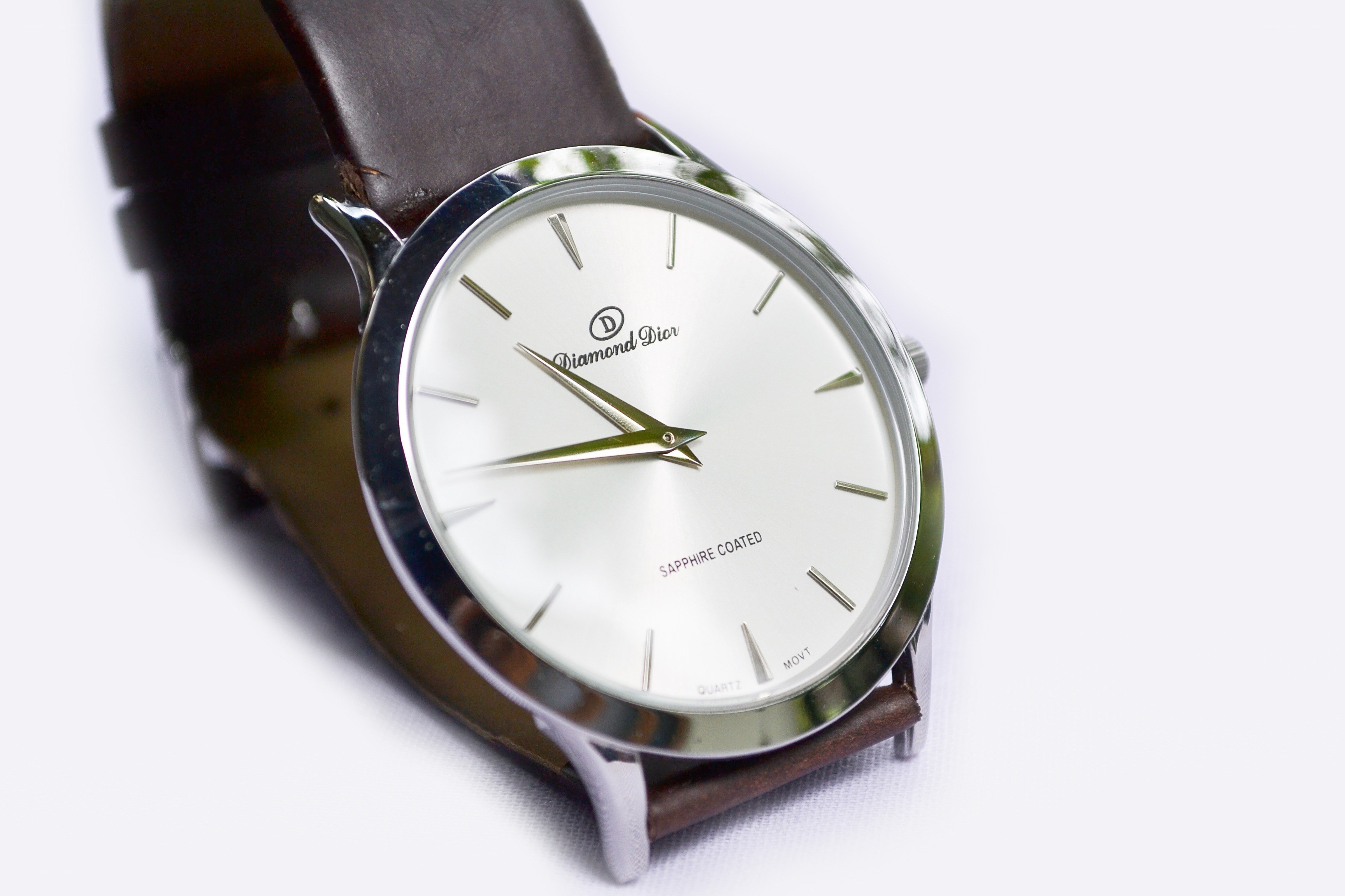 Diamond Dior watch with leather strap