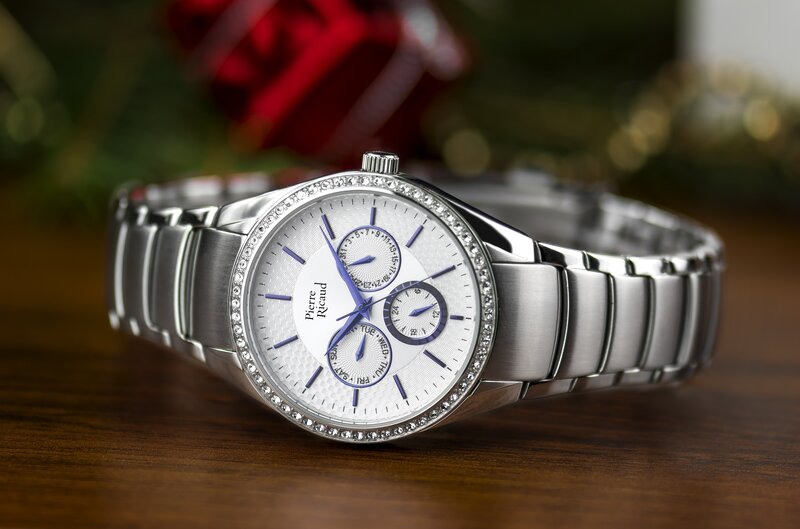 Diamond-encrusted watch with blue accents