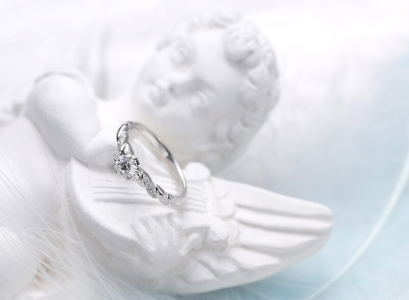 diamond ring on angel statue
