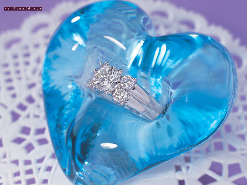Diamond ring on blue heart