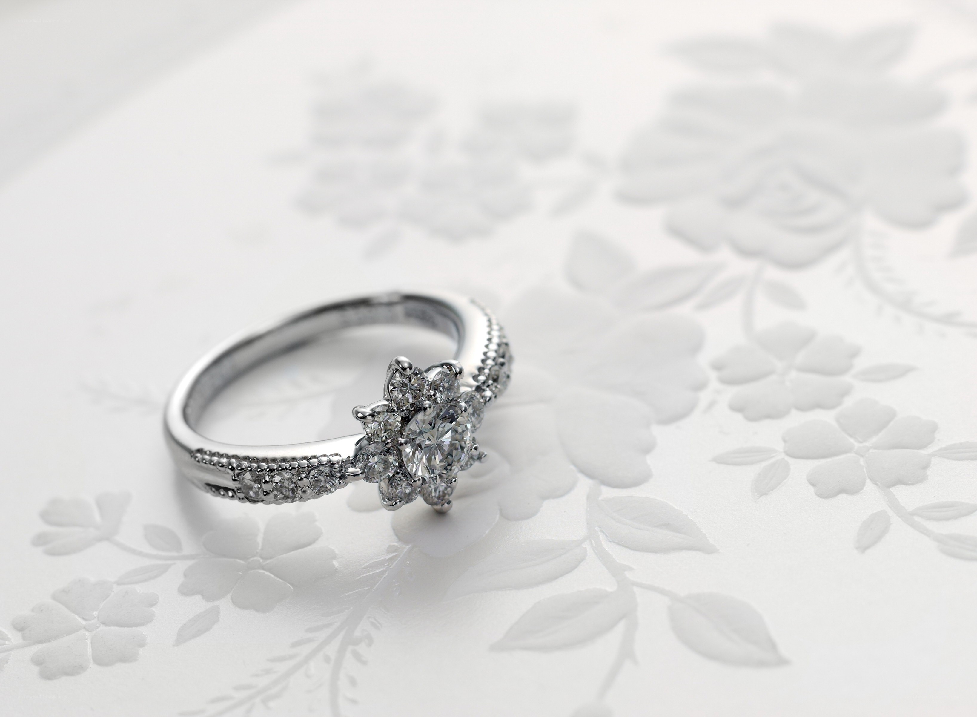 Diamond ring on floral surface
