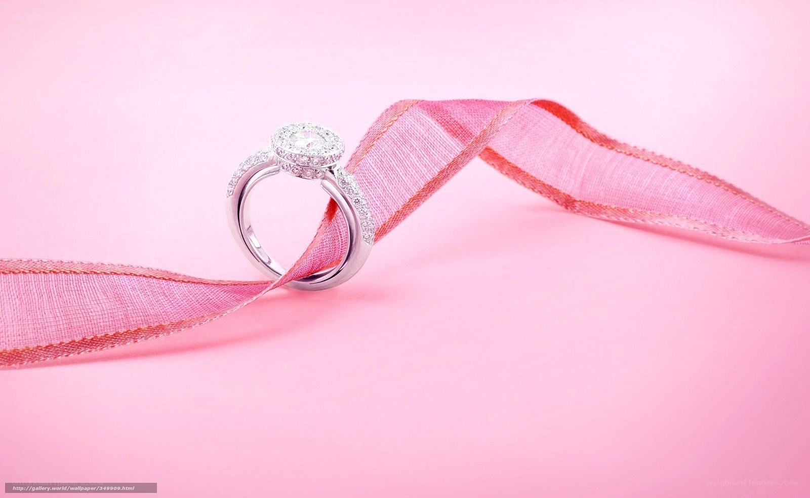 Diamond ring on pink ribbon