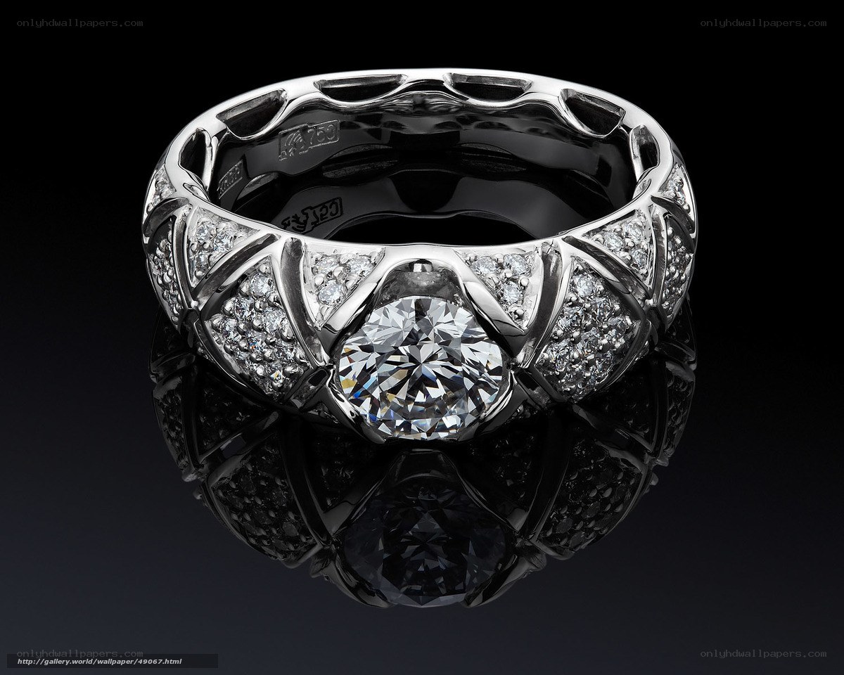 Diamond ring with central gem