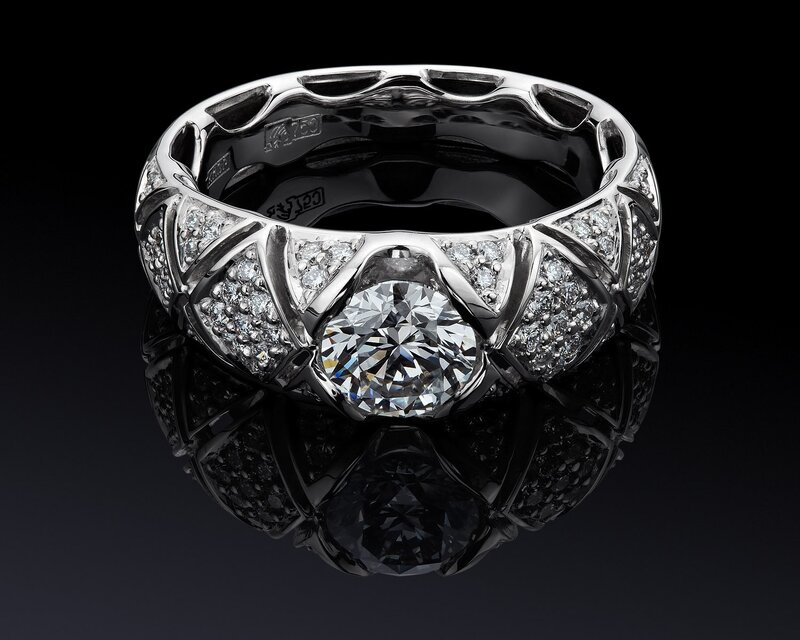 diamond ring with central gemstone