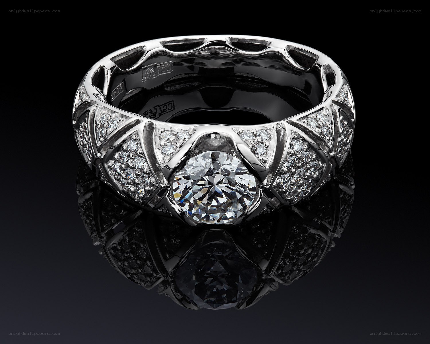 diamond ring with central gemstone