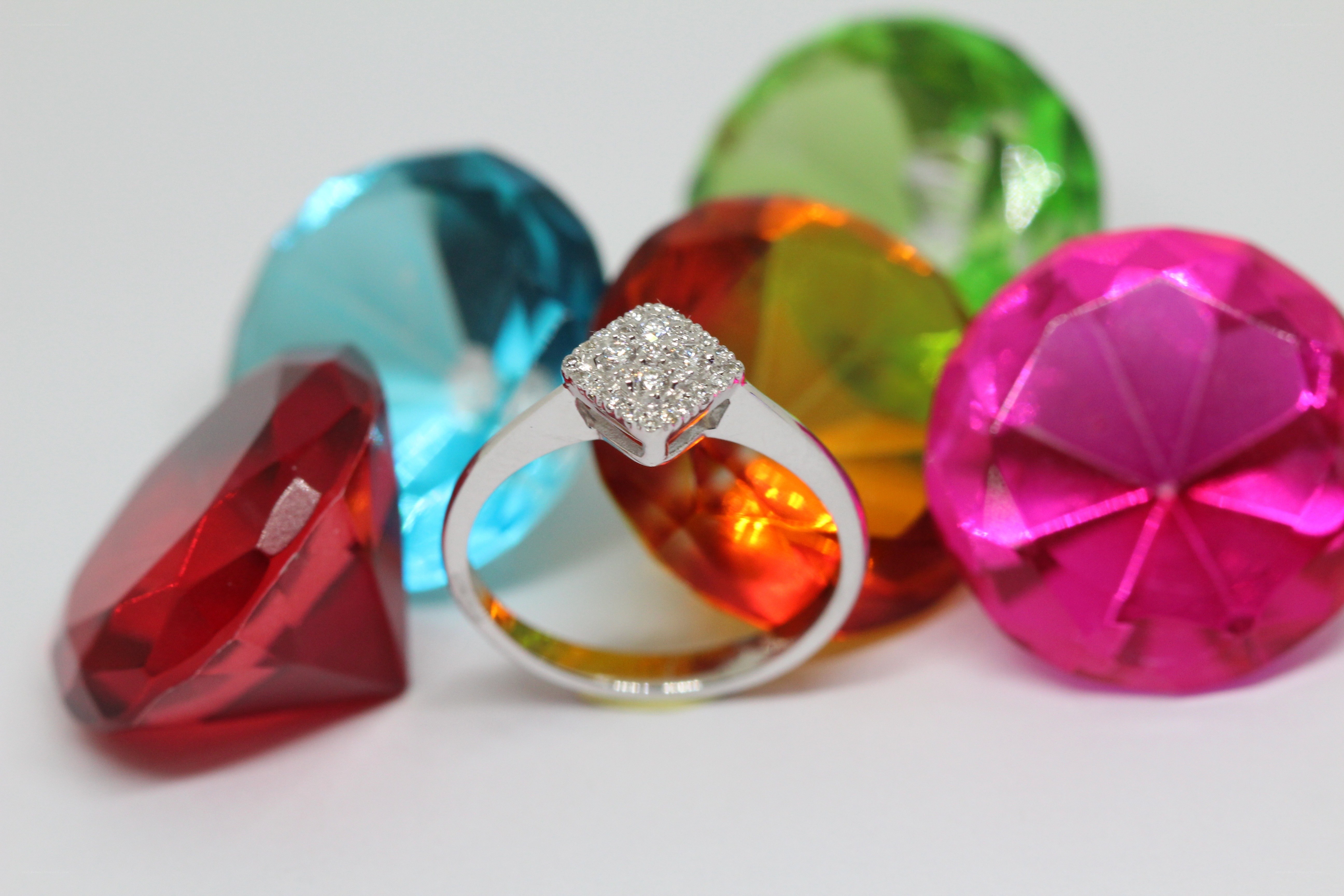 Diamond ring with colorful gems