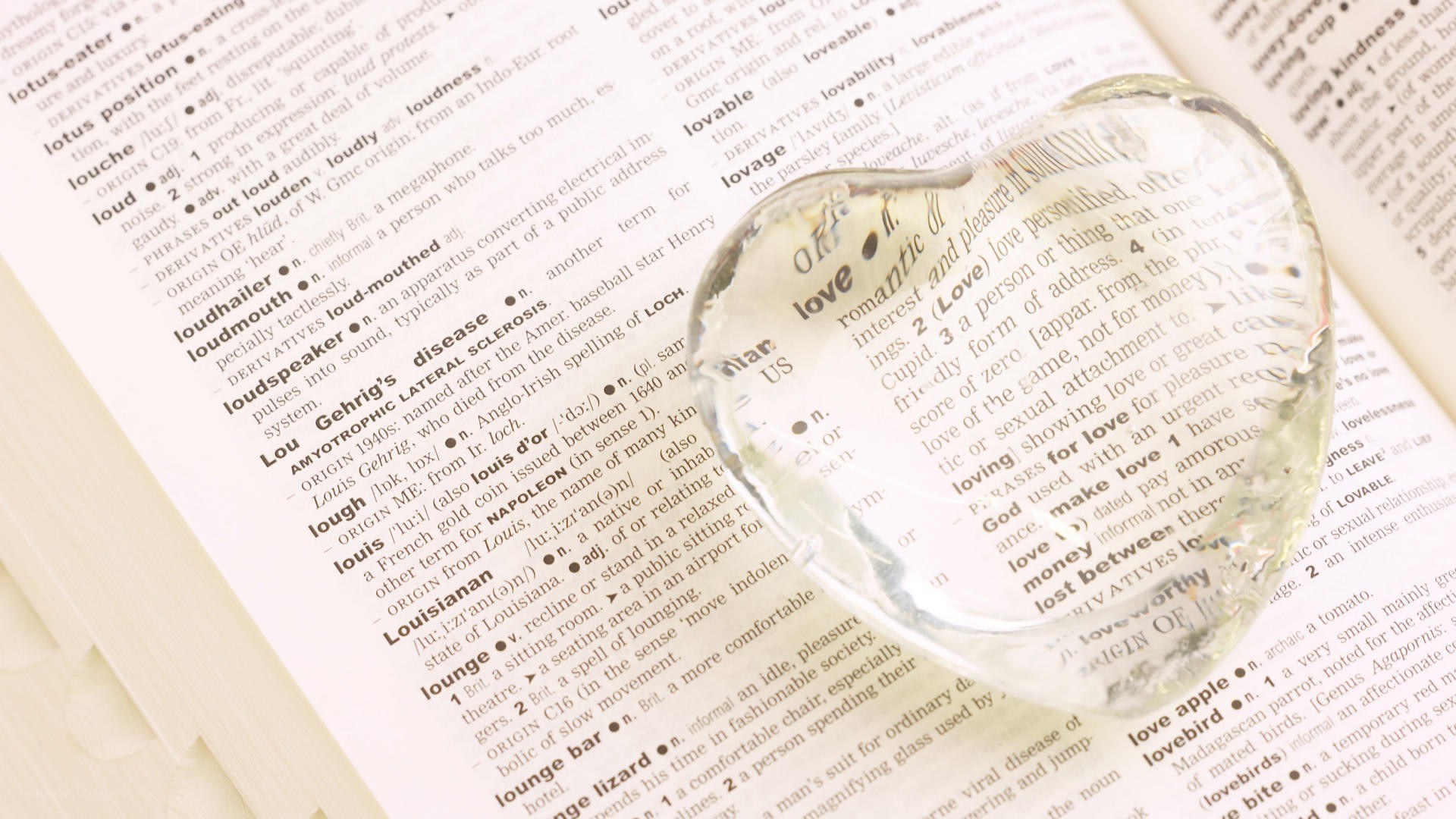 dictionary with heart-shaped glass