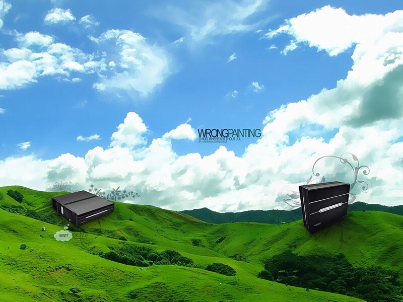 Digital devices on a green hill