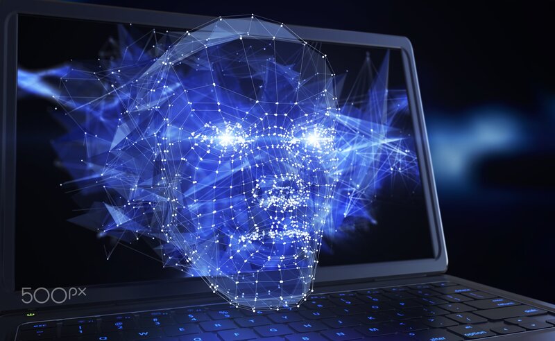 Digital Face on Laptop