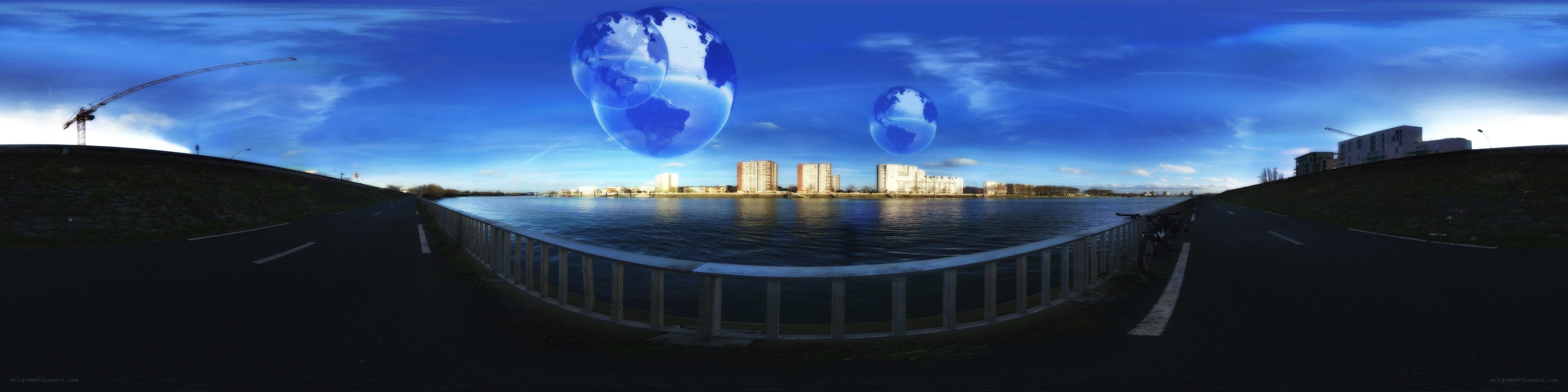 Digital globe over cityscape
