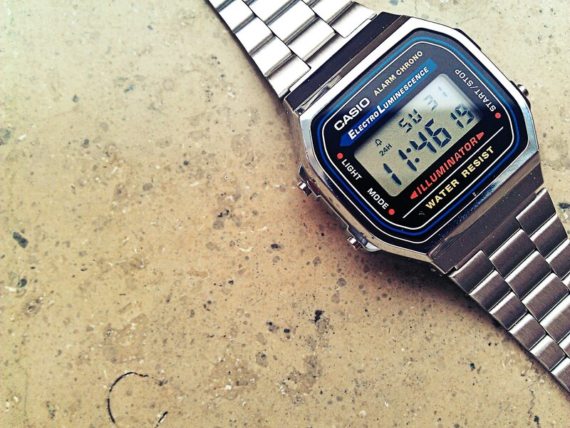 digital watch on concrete